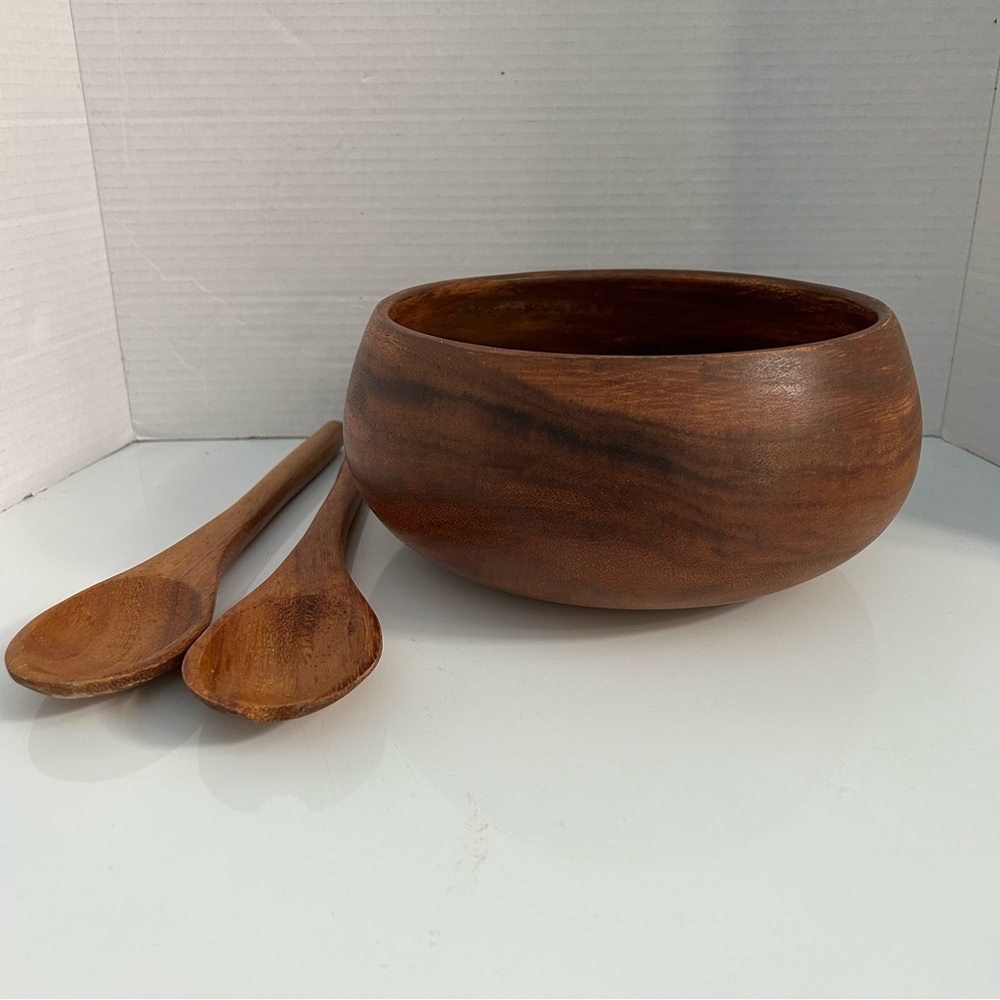 Handcrafted wood salad bowl with servers
